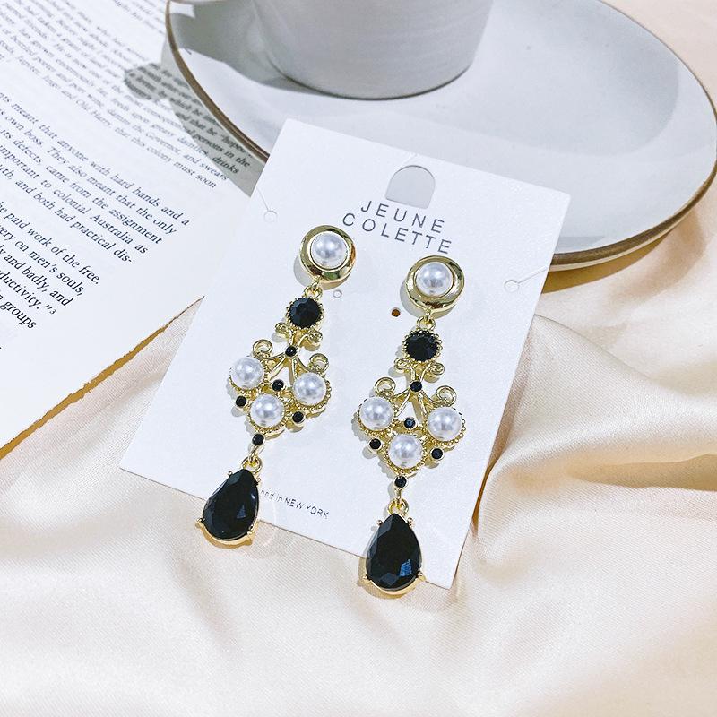 

Korean Black 925 Silver Needle Cross Earrings with Inlaid Pearl