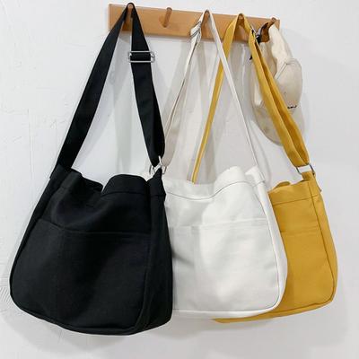 Sacs à bandoulière en toile grande capacité pour étudiants Sacs à main pour femme Sacoche coréenne Sac bandoulière en tissu de coton Sac d'école zippé pour femme