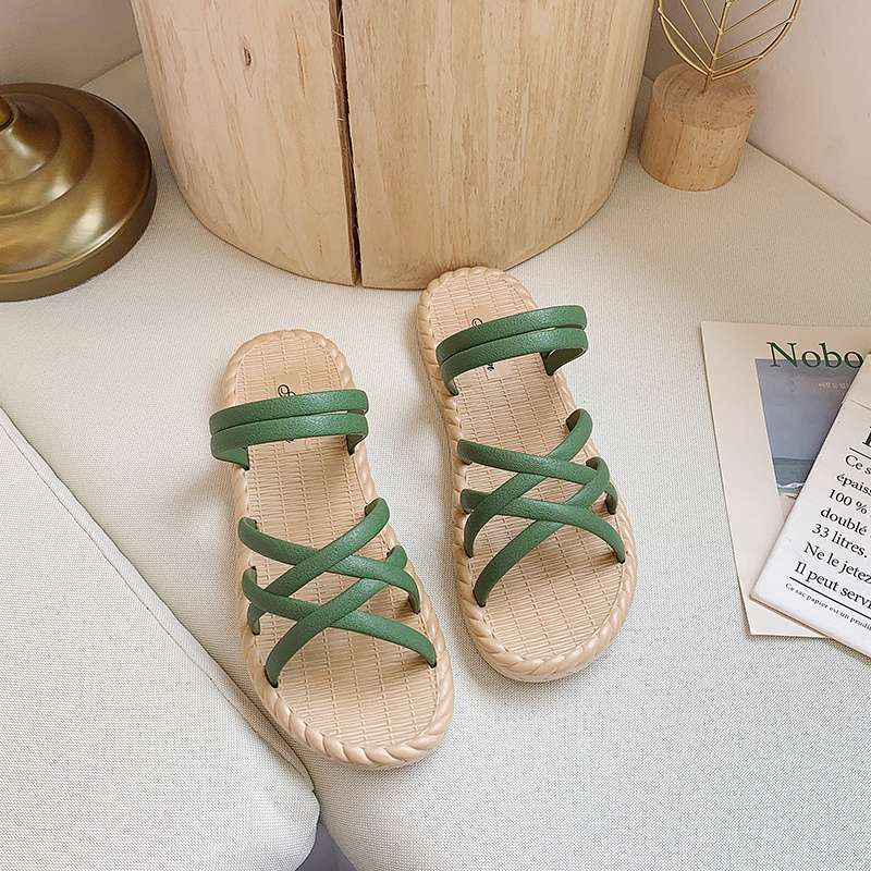 Cool slippers women's new summer fashion versatile flat-bottomed Korean version two wearing Roman sandals thick-soled beach women
