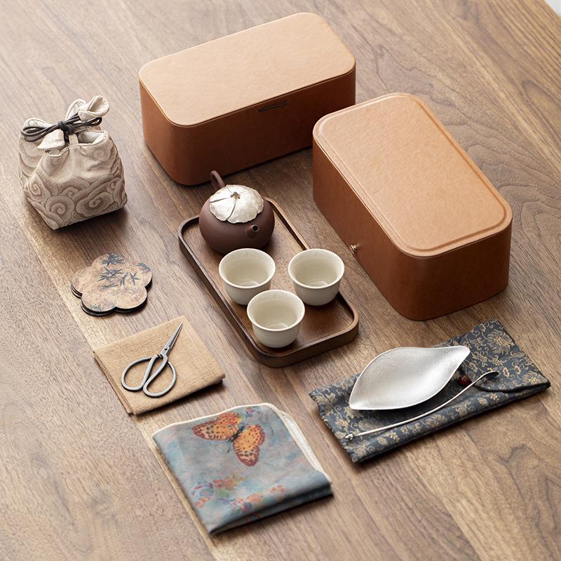 

Portable Gongfu Tea Set: Home Three-Cup Tray with Gift Box - Ideal Souvenir for Elders Purple clay teapot set