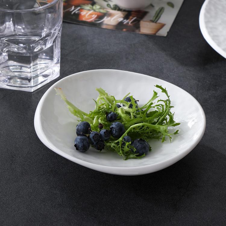 Creative Irregular Ceramic Dessert Bowl - Underglaze Colored, Small Rimmed Plate for Hotel Tableware.