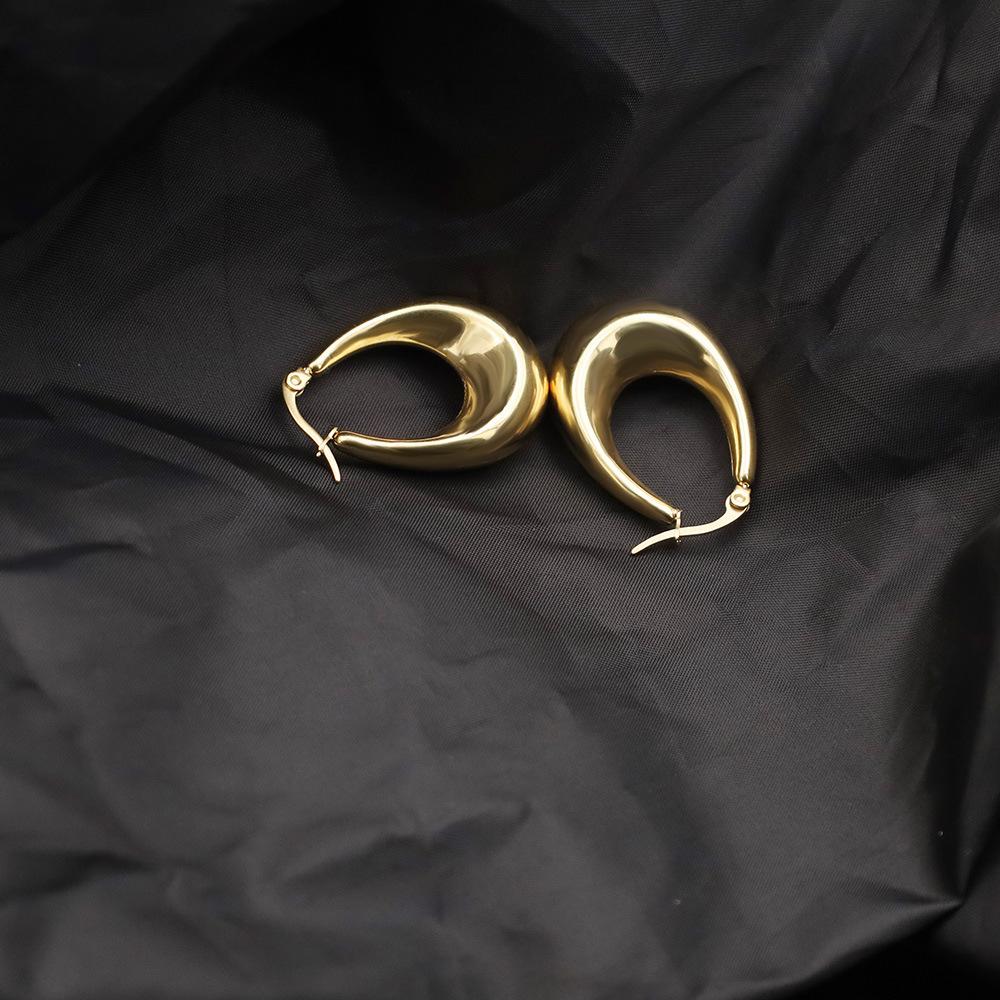 Wind French Retro Oval Hollow Titanium Steel Earrings High-End Light Luxury Earrings U-Shaped Earrings