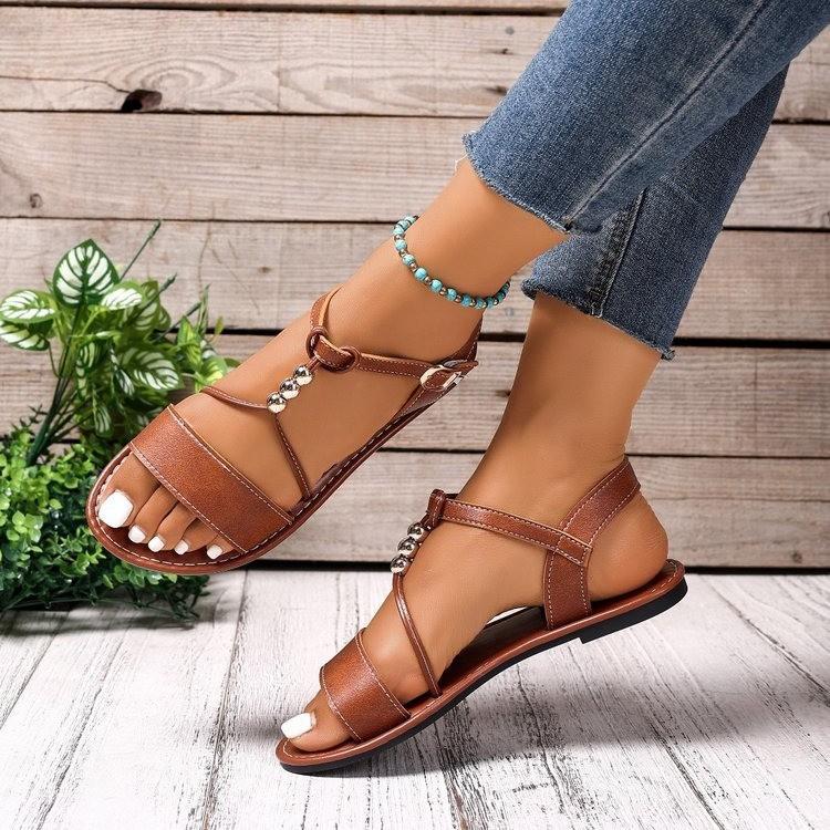 Foreign trade new large size beaded flat-bottomed casual sandals women's solid color one-word buckle with rhinestone beach cool slippers