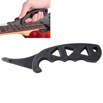  Schwarzer ABS-Kunststoff-Gitarrensaitenspanner sorgt dafür, dass die neue Saite sofort gestimmt bleibt. Gitarrenreparatur-Saitendehnungswerkzeug