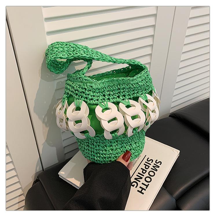 

New fashionable versatile niche design hand-woven bucket bag beach bag women s straw bag зелений