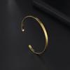 Elegant Adjustable Polished Bangle: Women's C-Shaped Bracelet with Engraved Pattern and Text Logo in Stainless Steel
