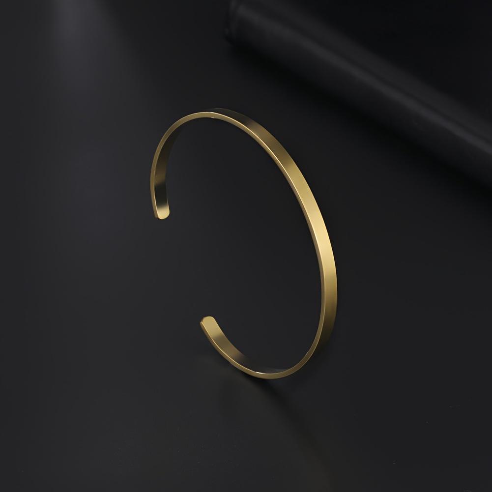 Elegant Adjustable Polished Bangle: Women's C-Shaped Bracelet with Engraved Pattern and Text Logo in Stainless Steel