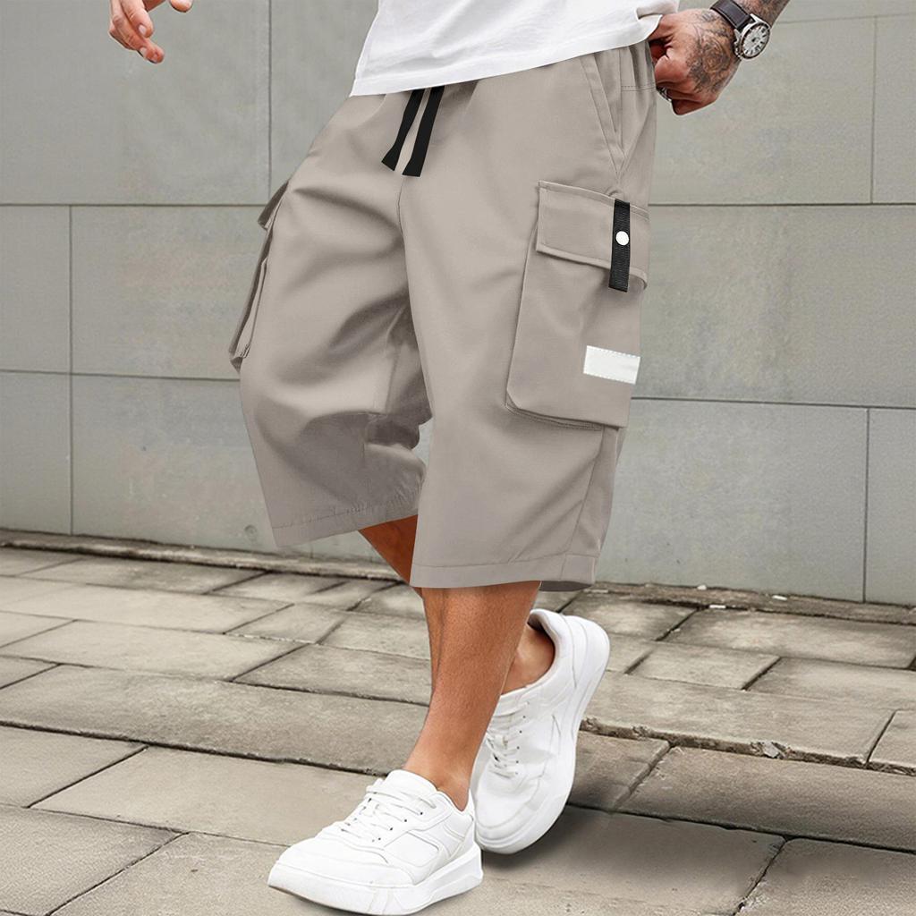 Men's casual and fashionable lace-up lightweight and breathable sports shorts. Men's loose and large-sized multi-pocket workwear shorts.