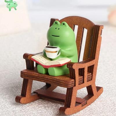 1Pcs Cute Healing Small Decoration Cute Mini Frog Resin Figurine Rocking Chair Design with Book Coffee Home Bedroom Office Decor