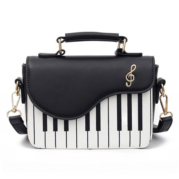 

Trendsetting Female Piano Bag Featuring Combinations And Accents Embroidered чорний