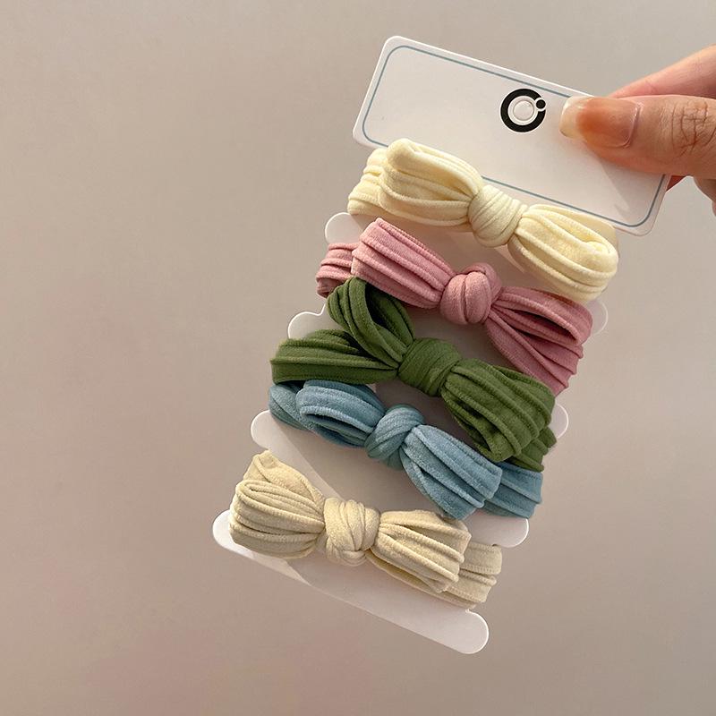 2025 New Women's Bow Hair Tie - High Elasticity & Durable Leather-Covered Rubber Band