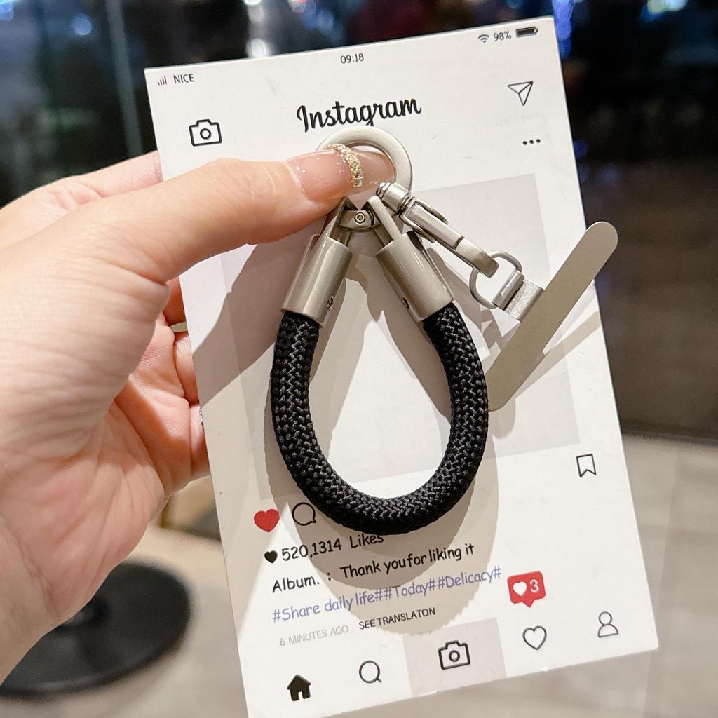 Kreativní šňůrka na palec pro mobilní telefon a přívěsek na klíče