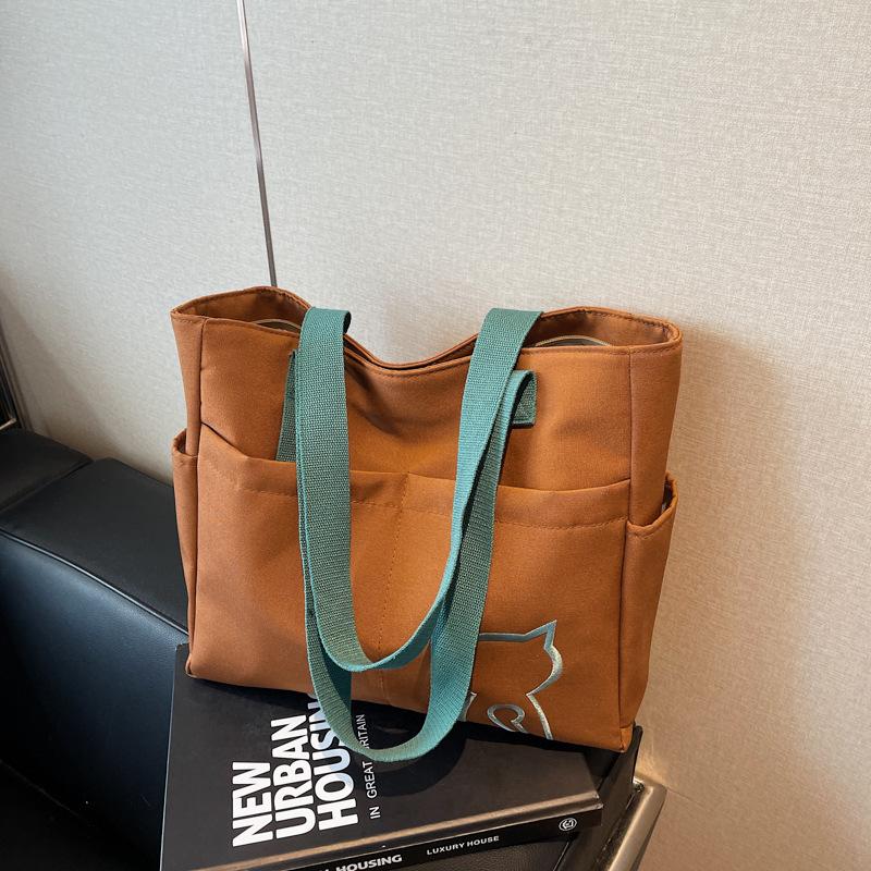 Large capacity canvas bag women's new fashion shoulder lightweight tote bag student class commuter bag