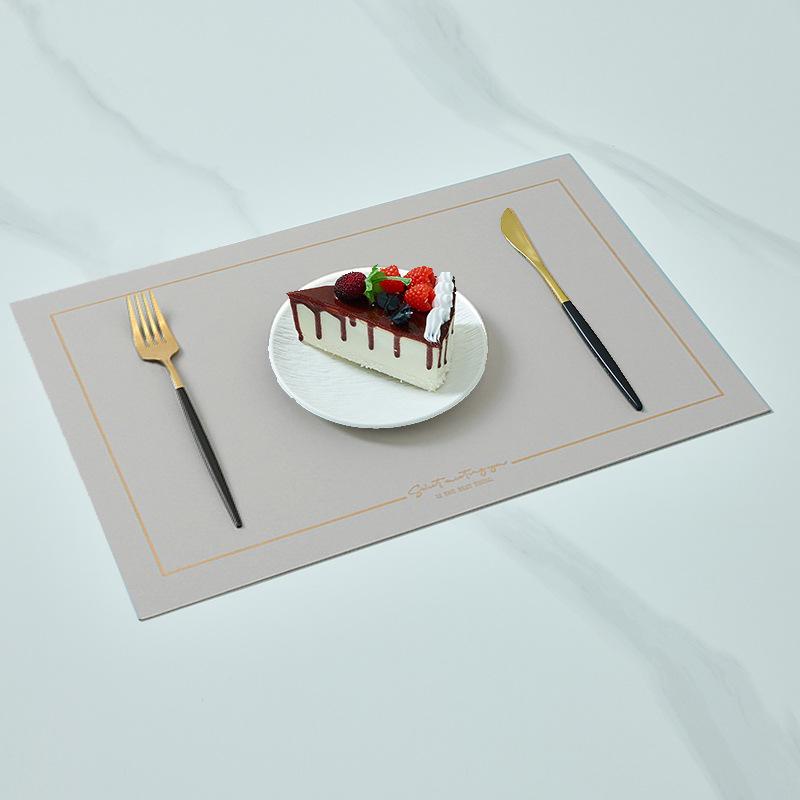 In Stock Waterproof Leather/PVC Placemat: Western Dining and Heat-Resistant Square Mat for Living Room or Hotel Use.