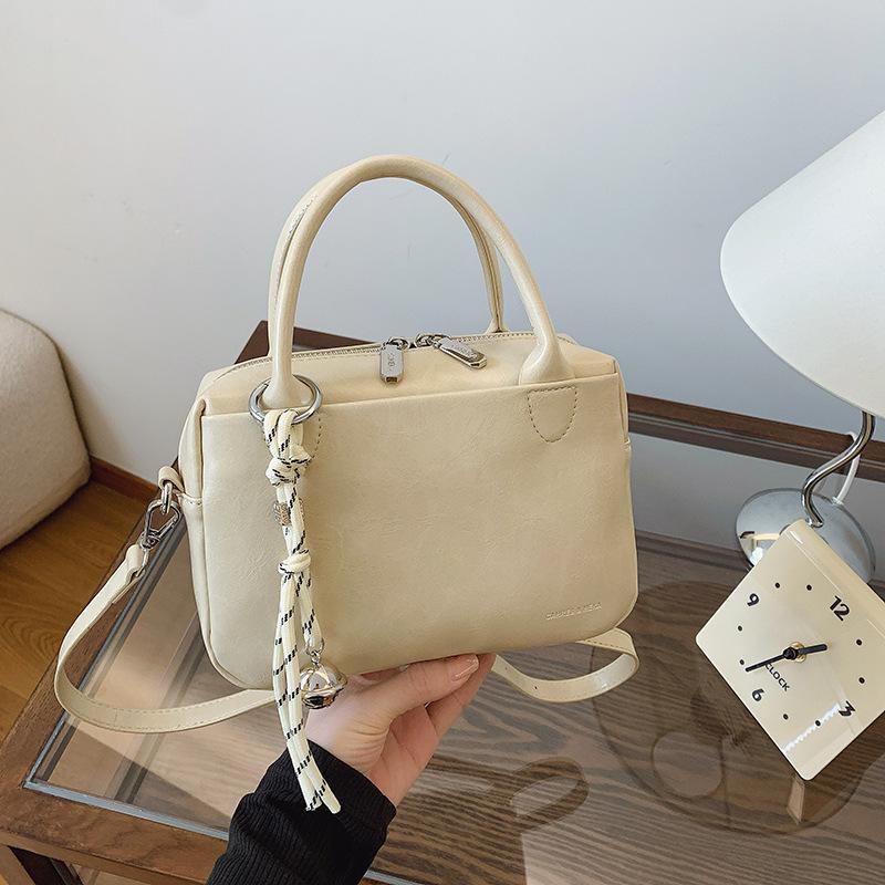 

Ручная переноска Маленькая квадратная сумка Женская Новая мода Универсальная сумка через плечо