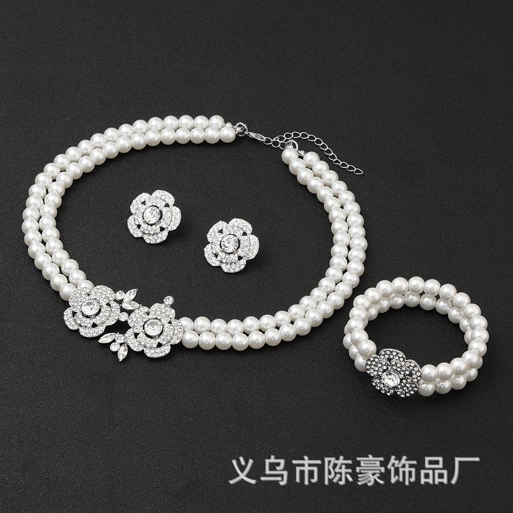 

Era Masquerade Accessories Pearl Flower Necklace Bracelet Earrings Three-piece Set