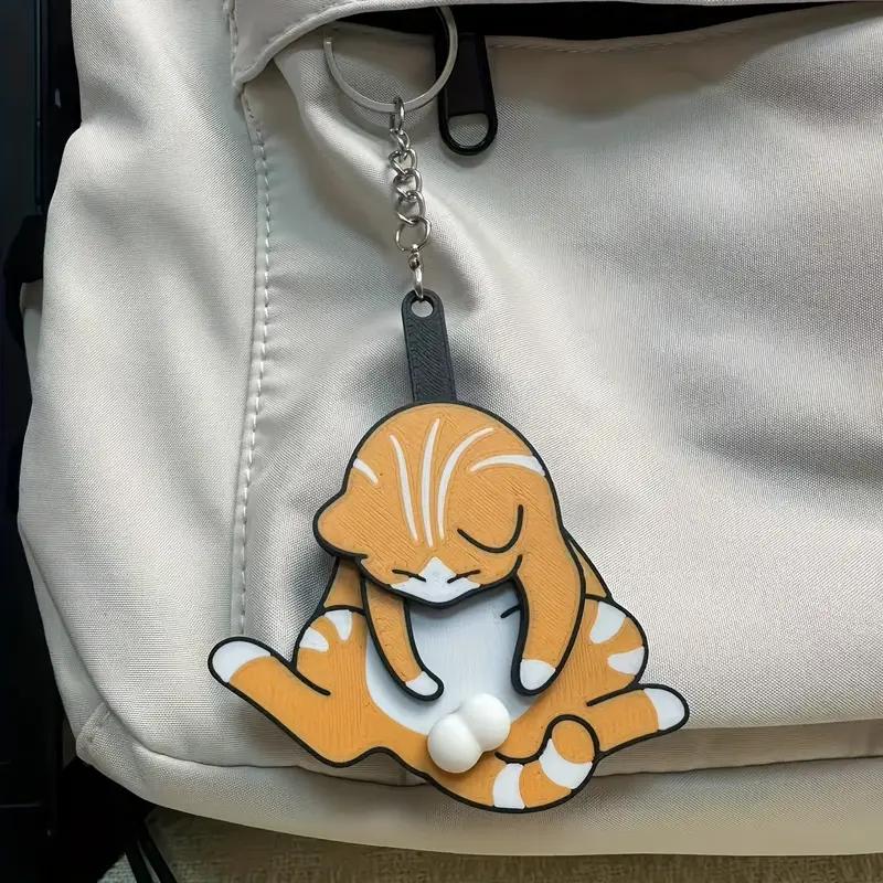 Creative Pull-Apart Cat Keychain - Cute Rotating Toy for Backpack and Bag Decoration