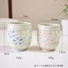 Hasami Ware Teacup Pair Set with Cherry Blossom Spiral Design.