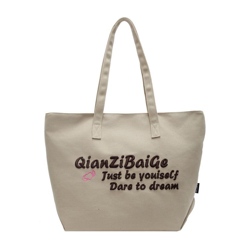 2024 autumn and winter new bag women's large-capacity handbag portable gift bag commute to school to work simple and fashionable