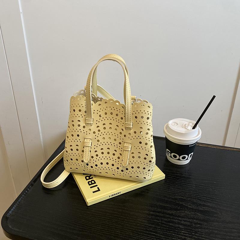 Niche design new engraved portable tote bag summer shoulder hollow vegetable basket bag women's bag messenger bag