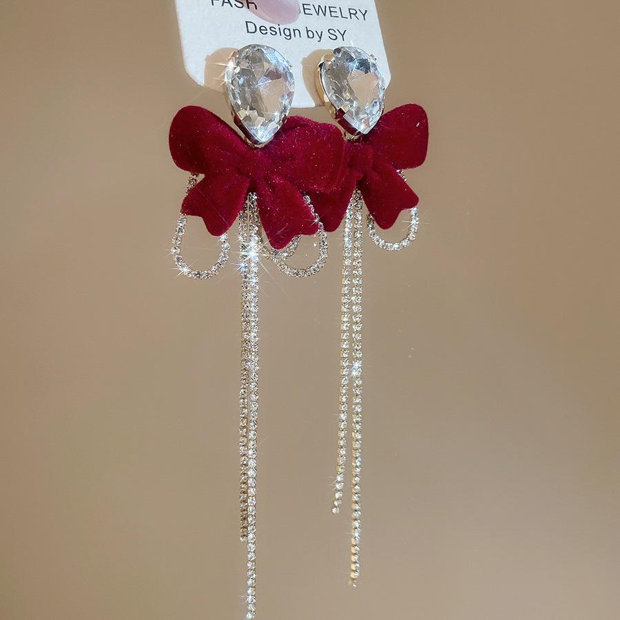 Diamond flocking butterfly fringed stud earrings autumn and winter light luxury temperament earrings design sense niche earrings