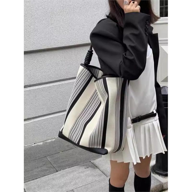 

Large capacity single shoulder niche design bucket bag tote bag striped women s contrasting color tote bag underarm commuter bag large bag