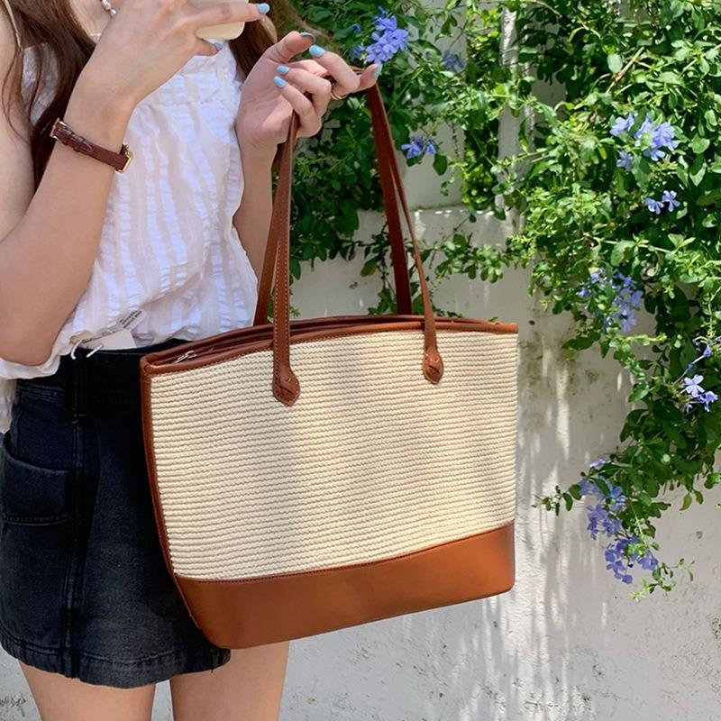 Sommer neue Nische Retro Textur Achseltasche Stroh gewebte Tasche große Kapazität einfache Tragetasche große Tasche