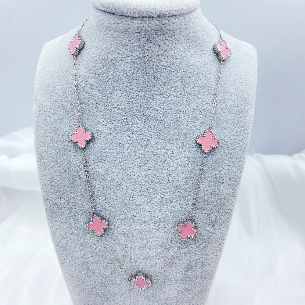 Collier de fleurs de trèfle à quatre feuilles pour la mode féminine, tempérament de luxe léger, chaîne de pull haut de gamme à sept fleurs