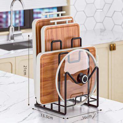 Držák na krájecí prkénko na nádobí a talíře