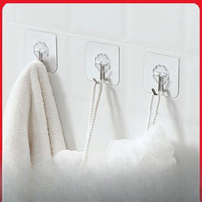 Transparent Hooks Are Used To Stick On The Door Leaving No Trace Behind. They Are Strong Adhesive Hooks for Bathrooms and Kitchens Without Nails