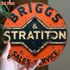 Vintage Briggs Stratton Metallschild Orange Schwarz Retro Garagenwanddekoration