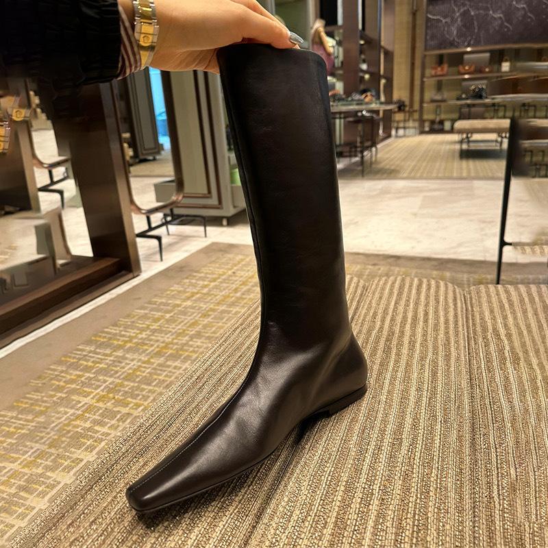 Korean version niche simple row style flat-bottomed medium boots thin boots women 2025 long tube square head but knee high boots