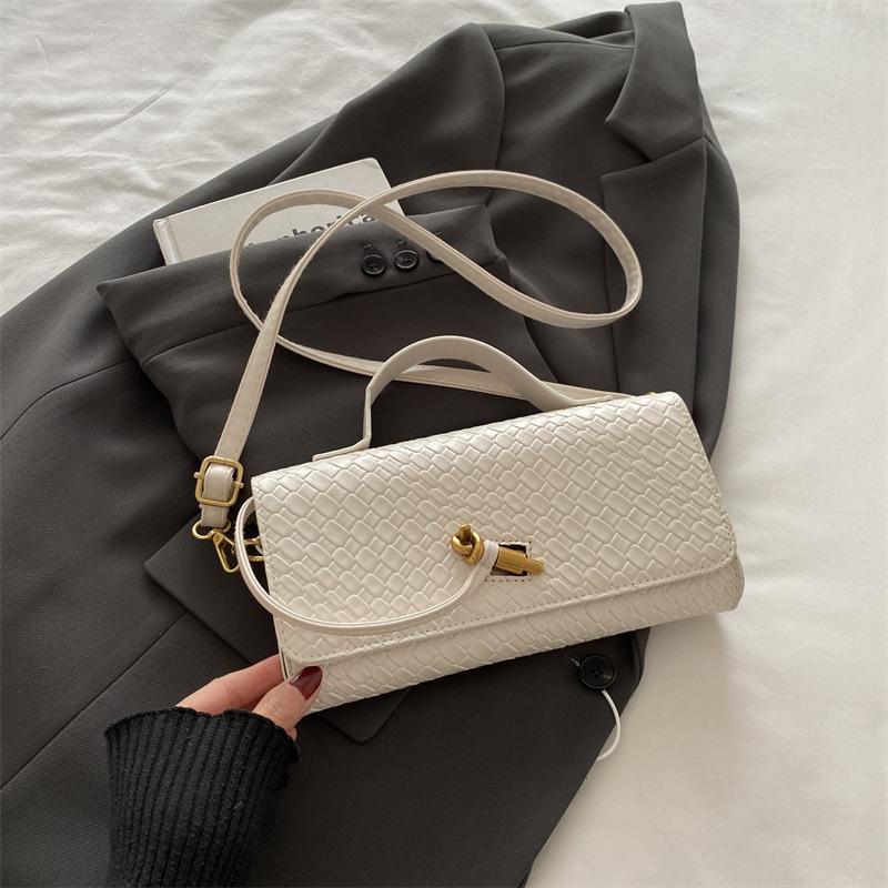 

Fashion exquisite weaving 2025 solid color casual lock large capacity foreign style horizontal cross shoulder baguette women s bag