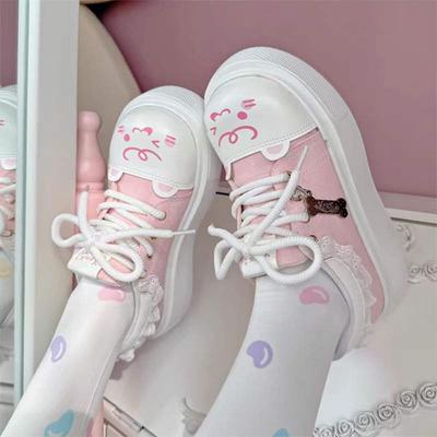 Studente carino testa di gatto muffin suola spessa scarpe da donna 2025 primavera e autunno nuovo pelle morbida testa grande aumento di altezza scarpe bianche da donna
