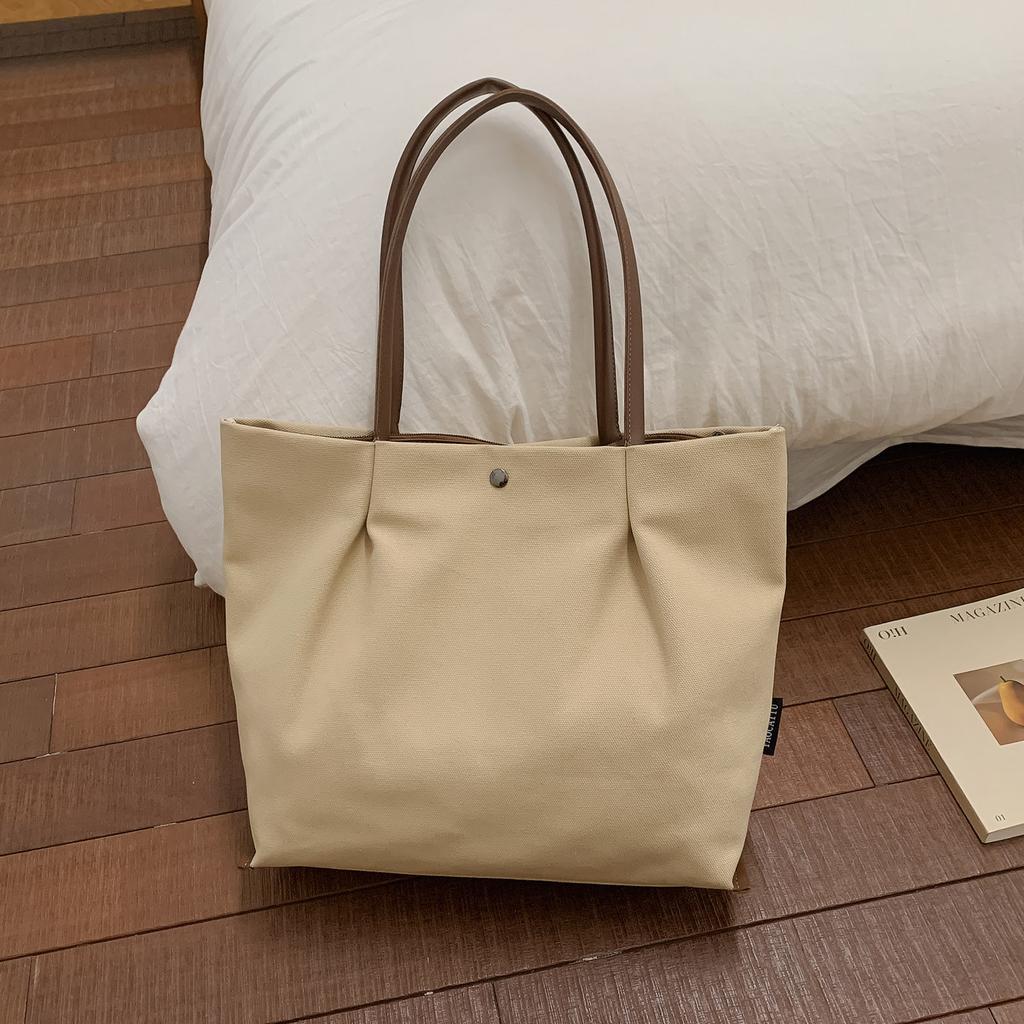 Japanese Casual Canvas Bag Women's Large Capacity Lightweight Handbags 2026 New Solid Color Commuting Shoulder Bags