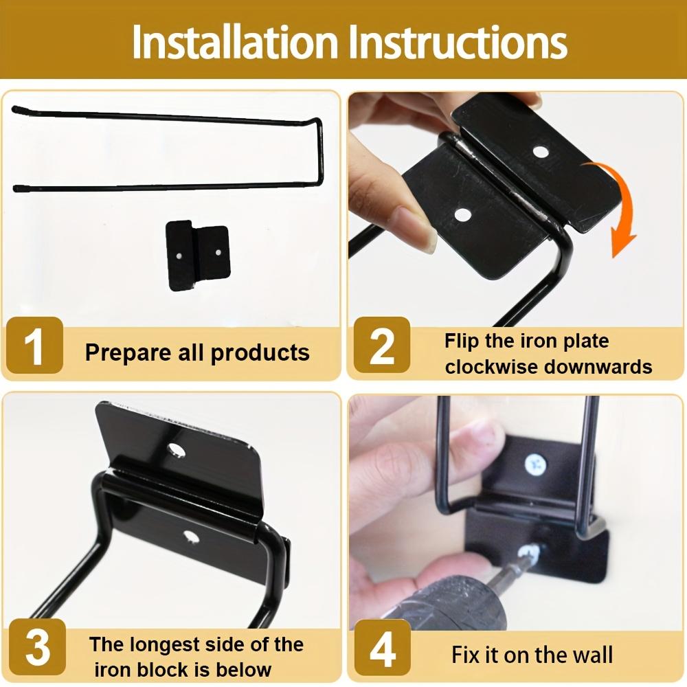 Wandmontierte Haken zur Aufbewahrung von Gartengeräten, einschließlich Aufhängern für Schaufeln und Rechen, entwickelt zur Organisation von Hofwerkzeugen.