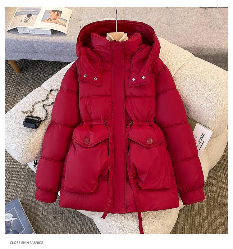 Padded clothes women's winter new long padded jackets close waist and look thin, thickened padded clothes, and thickened warm jackets.
