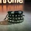 Set di Braccialetti Punk in Pelle Multistrato Catena con Occhio Stella Borchie Braccialetti per Uomini Donne Accessorio Streetwear Gotico