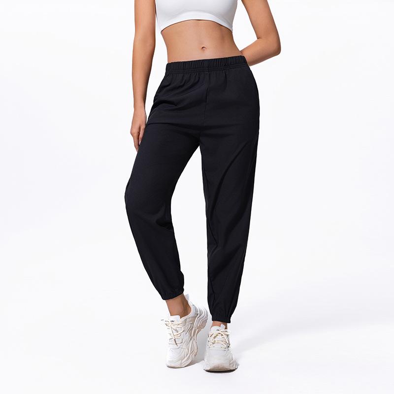 

Весенние и летние тонкие женские быстросохнущие спортивные повседневные брюки из сетчатой ткани с дышащими черными вставками универсальные спортивные брюки с девятью точками для бега шаровары XL чёрный