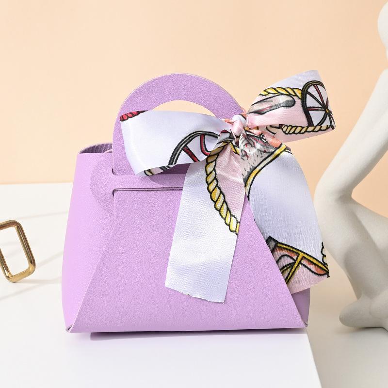 20 Stück Leder Geschenkbeutel Schleife Verpackungsbeutel Hochzeitsgeschenk Verteilungsbeutel Süßigkeiten Verpackungsbox Rosa Mini-Handtasche