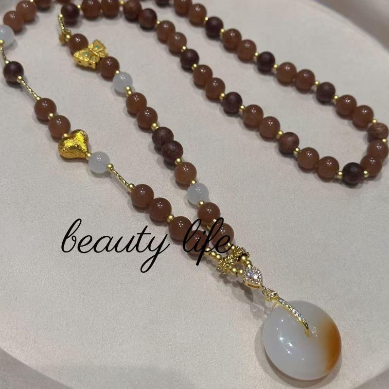 

Caramel and sandalwood peace buckle necklace sweater chain new chinoiserie casual retrofashion