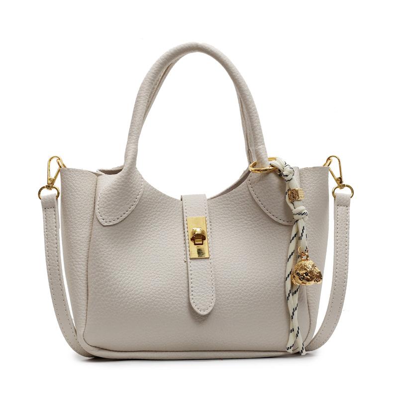 Korean version of trend temperament light luxury lychee pattern portable bucket bag women commute to work simple advanced sense messenger bag bag