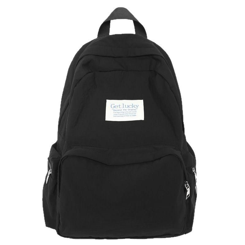 Schoolbag new Korean version large-capacity backpack female sweet and cute primary and secondary school schoolbag solid color simple travel backpack