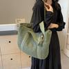 Handwoven Straw Tote Bag Women's Summer Beach Bag with Tassel Detail and Lightweight Design