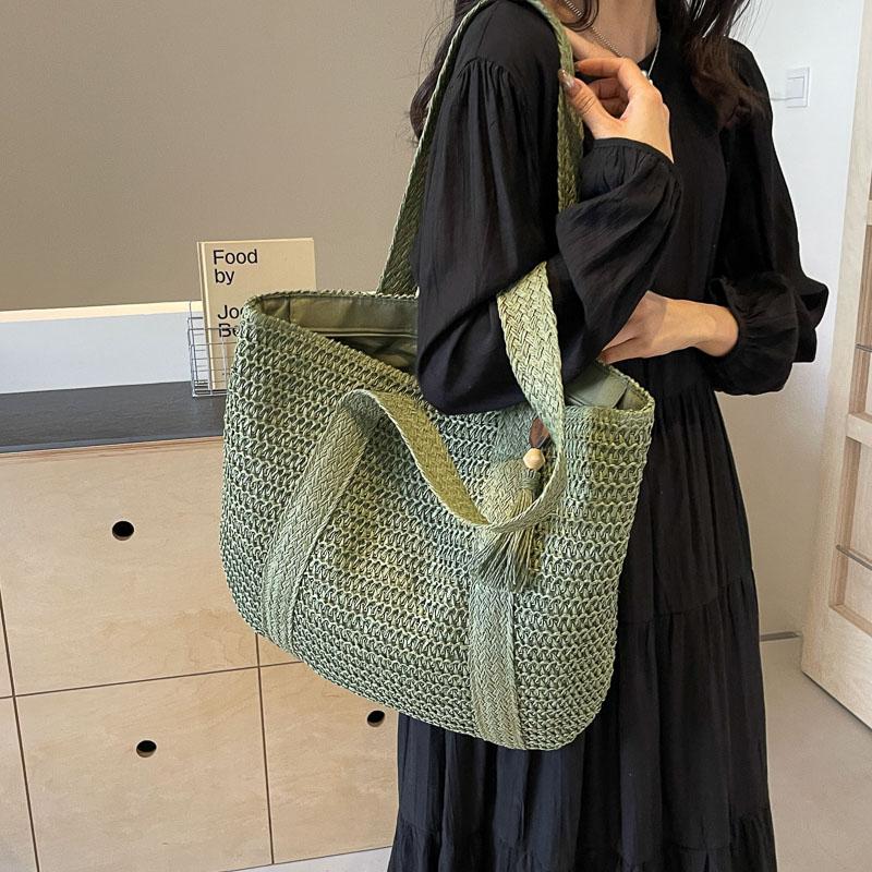 Handwoven Straw Tote Bag Women's Summer Beach Bag with Tassel Detail and Lightweight Design