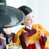 A Pair of Traditional Korean Dolls Wearing Hanbok and Gat