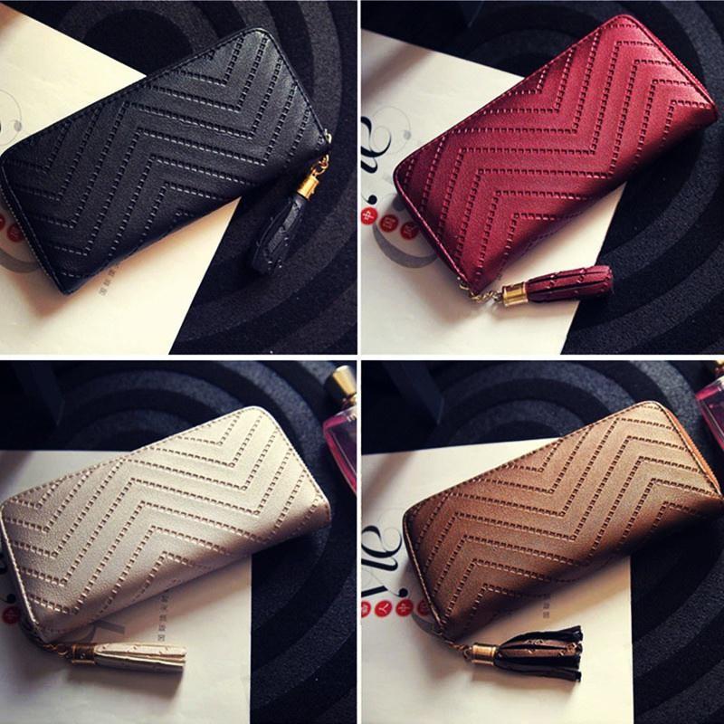 Stylish Long Zipper Wallet For Women With Trendy Tassel Design In Elegant Colors