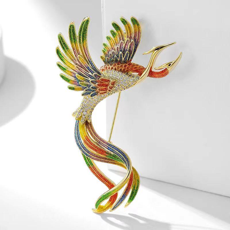 High-End Enamel Brooch: Retro Phoenix Perching on Wutong Tree, Perfect for Women's Cheongsam and Suit Accessories in Ancient Style.