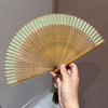 Fan, a New Chinese-Style Folding Fan for Home Use, Solid Color Fan, Chinese Style Portable Hollow Bamboo Fan, Suitable for Pairing with Qipao and