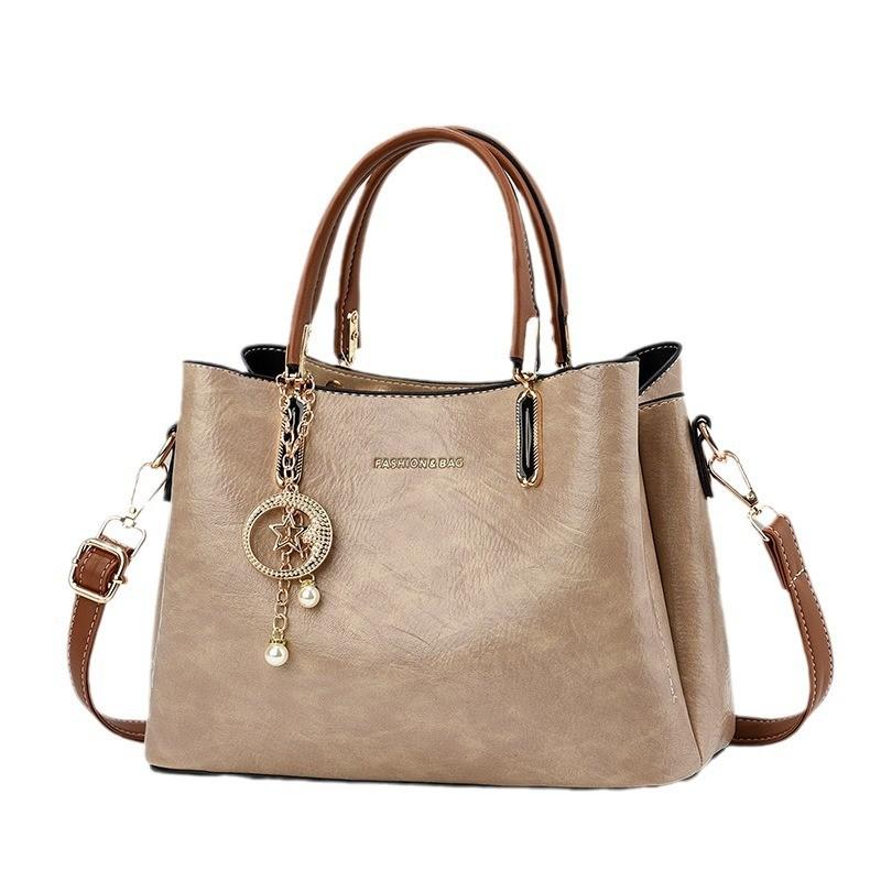 Chic Vintage Inspired Pu Handbag For Women With Ample Space And Trendy Design